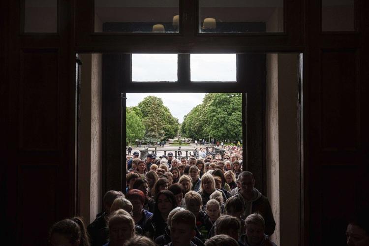 AP PHOTOS: 3 Ukrainian siblings buried after Russian missile strike