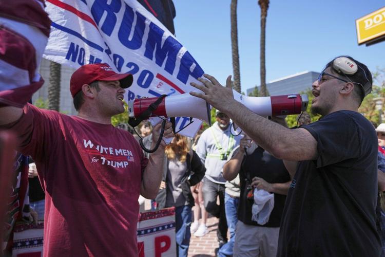 The Latest: Los Angeles police have made nearly 400 arrests and detentions since Saturday