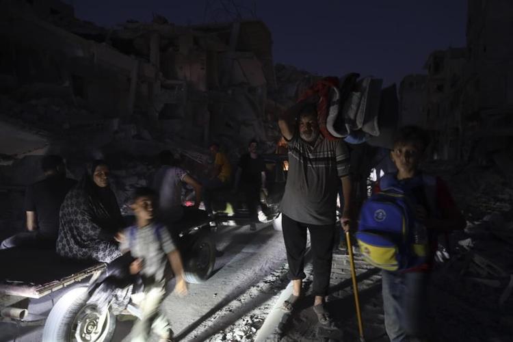 Strike kills family as Israeli evacuation order sparks panicked flight from southern Gaza city