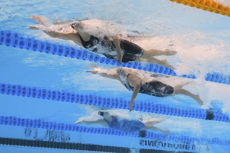 Summer McIntosh wins first gold medal at worlds in her quest for five