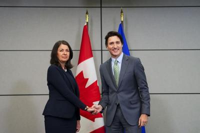 Alberta premier says landing missed on limp handshake with prime minister