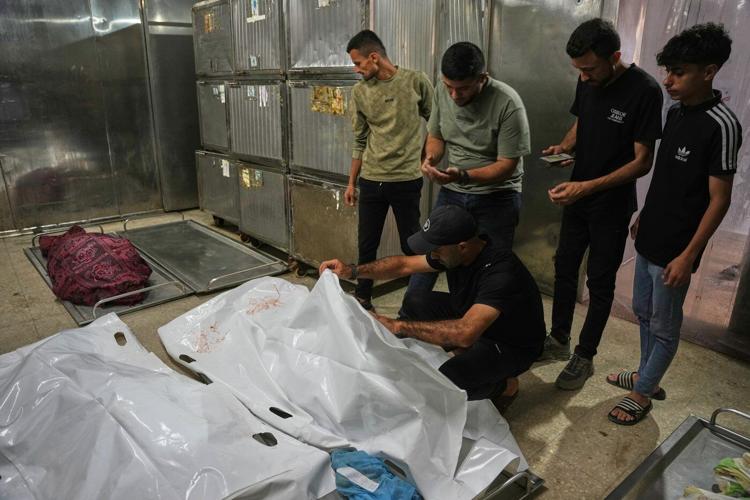 An Israeli strike hits a Gaza City apartment, killing 2 children, Palestinian health officials say