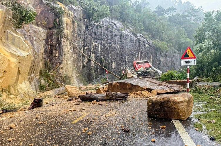 Landslide strikes bus on mountain pass in Vietnam, killing 6, as heavy rain persists