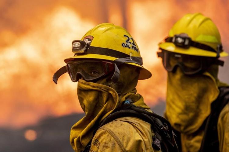 People flee Idaho town through a tunnel of fire and smoke as Western wildfires spread