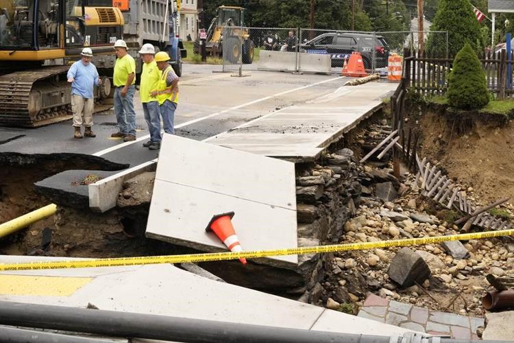 New England getting more rain, watching Hurricane Lee's path after flooding, sinkholes