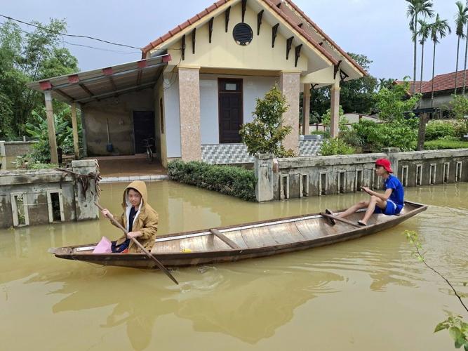 Floods kill 13 in Central Vietnam as rescue operations push forward
