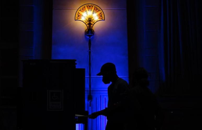 AP Photos: America votes in laundromats, schools, libraries