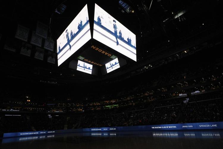 World figure skating championships pause to remember those who died in plane crash