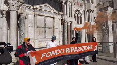 Climate activists pour mud and Nesquik on St. Mark's Basilica in Venice