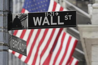 Stock market today: Wall Street holds steadier as oil prices pare their gains
