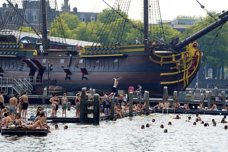 Surrounded by water, Dutch swimmers have plenty of places to cool off