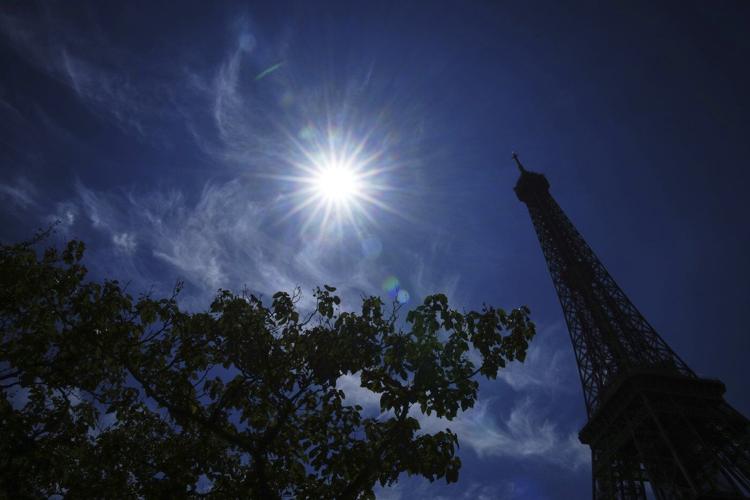 Barcelona records hottest June and Eiffel Tower's summit closes as Europe sizzles
