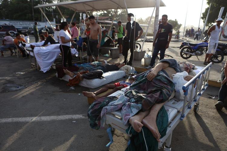 Venezuelans in the US rush to send aid to earthquake victims, but Caracas airport is closed