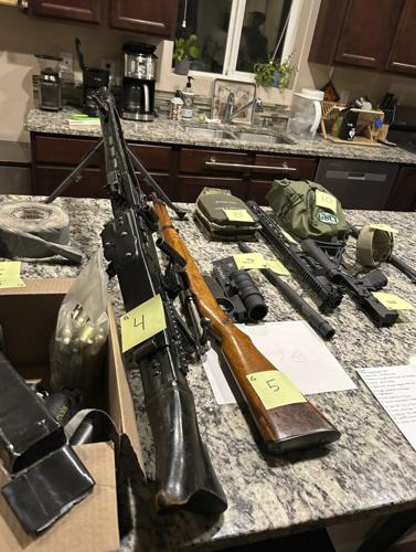2 arrested with arsenal and Nazi paraphernalia after base robbery were ex-military, prosecutors say