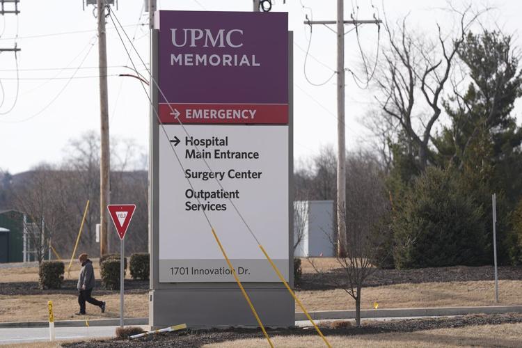 Prosecutor says officer killed in gunman's Pennsylvania hospital siege was hit by police fire