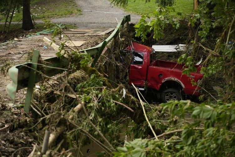 Flash flooding again hits West Virginia communities still trying to clean up from deadly deluge