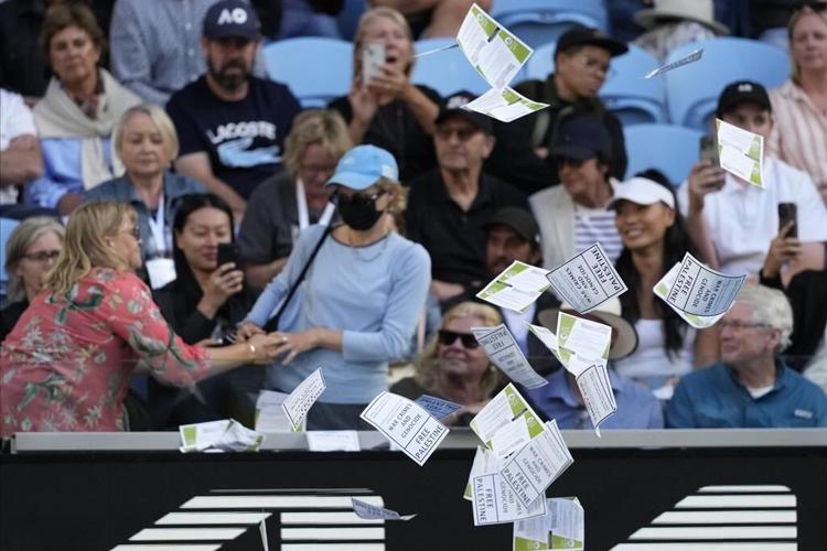 Protester throws papers on court, briefly disrupts Australian Open match between Zverev and Norrie