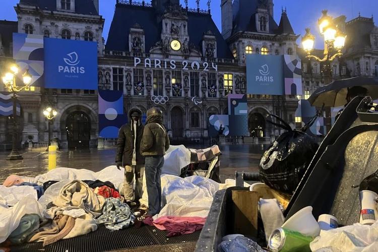 French police evict hundreds from abandoned Paris warehouse ahead of Olympics