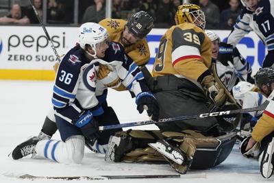 Jets forward Barron receives 75-plus stitches after taking skate blade to face