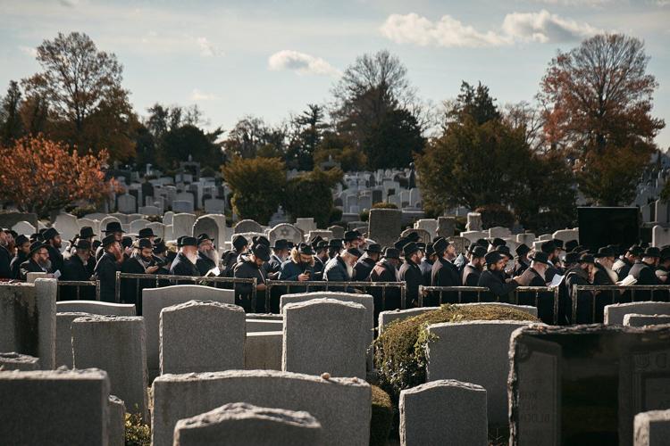 Photos of Hasidic Jewish rabbis praying at resting place of 'the Rebbe' in New York