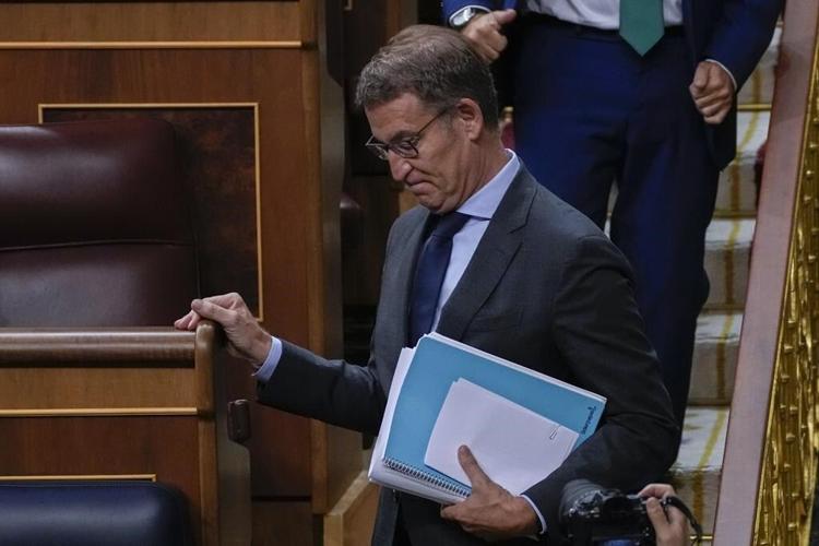 The leader of Spain's conservatives makes a 2nd bid to become prime minister