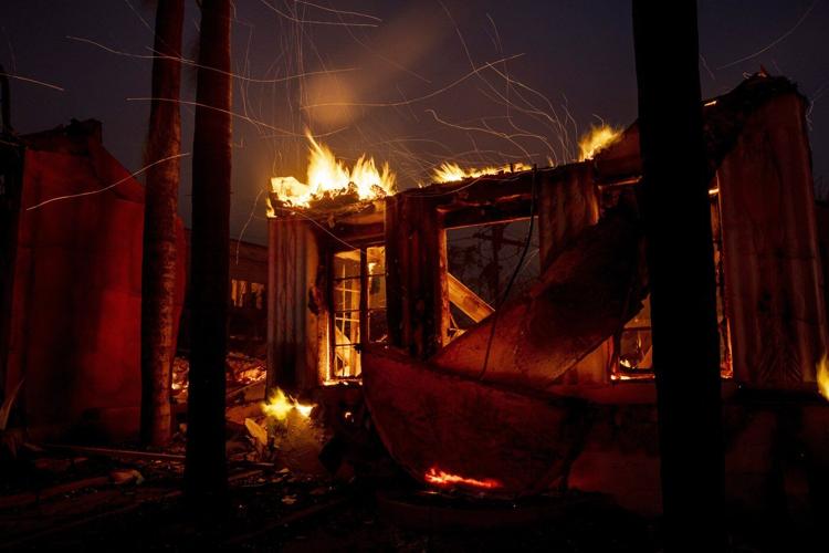 Firefighters make progress slowing wildfires while Los Angeles grapples with scope of devastation