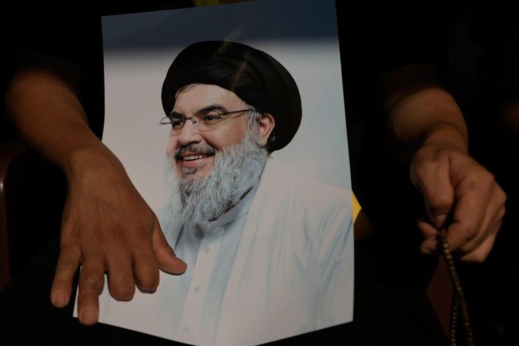 Photos show Hezbollah supporters honoring slain leaders Nasrallah and Safieddine despite PM's ban