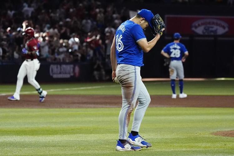 Blue Jays blow 7-run lead, but recover to beat Diamondbacks 8-7