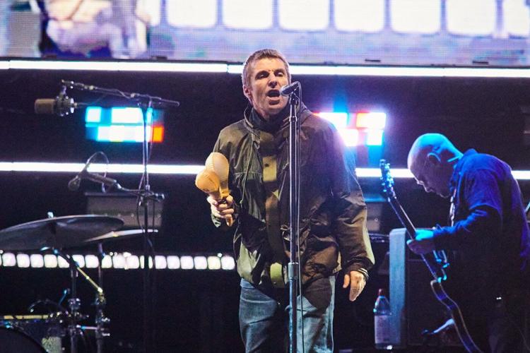 Drenched and nostalgic, Oasis marks Toronto return amid sudden downpour