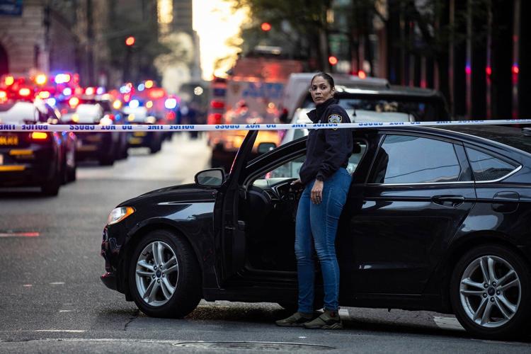 Gunman kills 4, including police officer, in shooting at New York City office tower