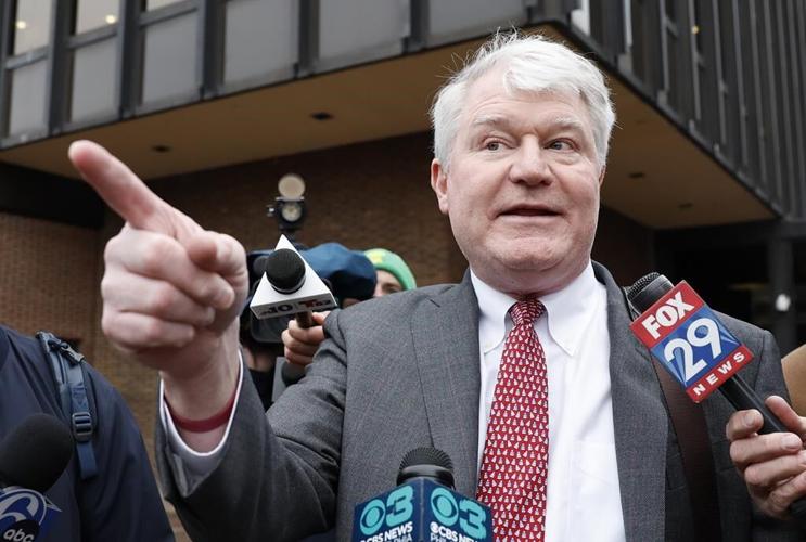 Pennsylvania Supreme Court justice in courtroom for brother's federal sentencing for theft, bribery