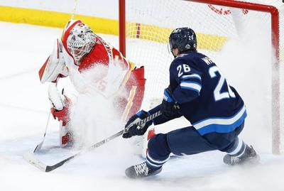Calgary Flames keep their playoff hopes alive with victory over Winnipeg Jets