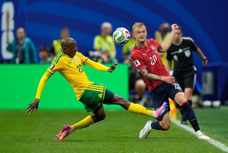 South Africa keeps its World Cup hopes alive with a 1-1 draw against the Czech Republic