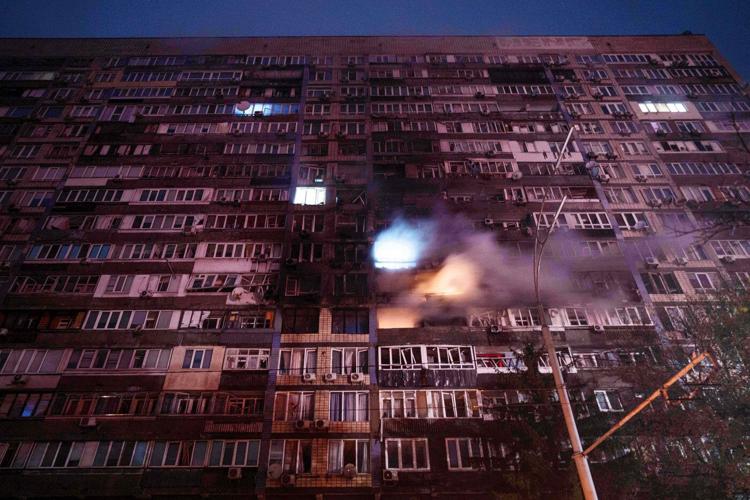 Russian strikes cause damage across Ukraine's capital and injure at least 12