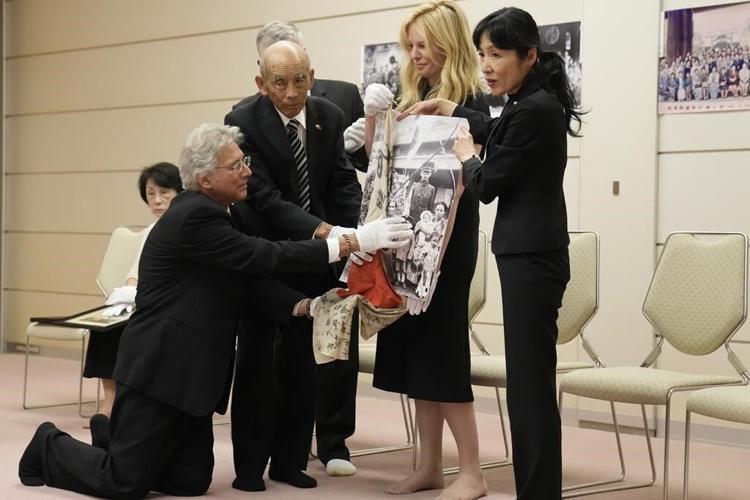 It's a miracle, say family of Japanese soldier killed in WWII, as flag he carried returns from US
