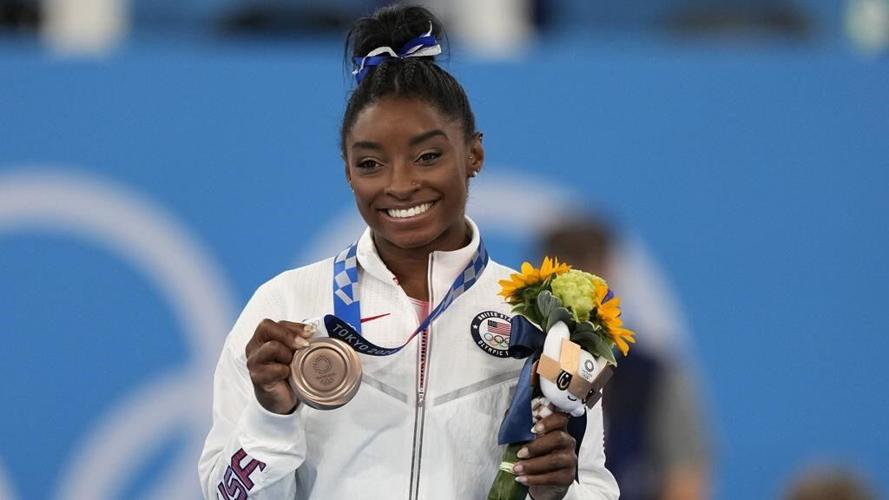 Gymnastics star Simone Biles returning to competition in August in first meet since 2020 Olympics