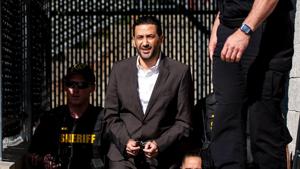 Police challenge father's story in murder trial