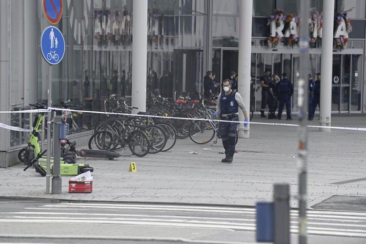 Finnish police say a suspect is arrested in the stabbing of 4 people at a mall in Tampere