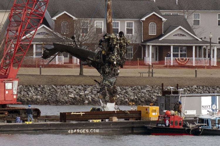 Helicopter crew in collision with plane may not have heard key instruction from tower, NTSB says