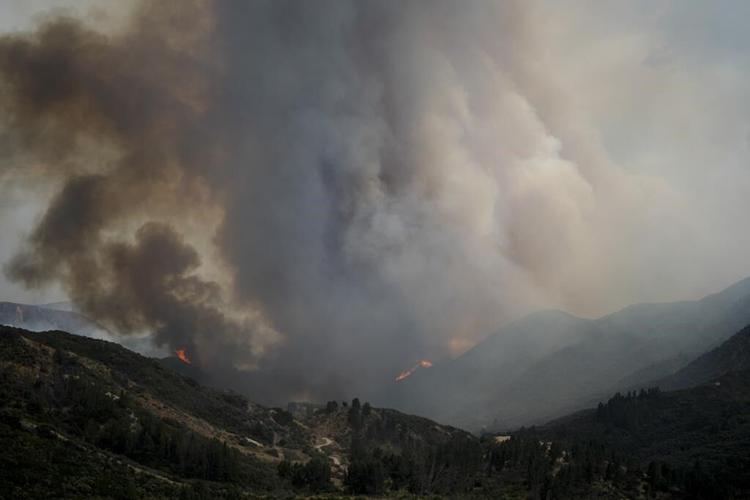 Evacuations ordered as wildfire burns in foothills of national forest east of LA
