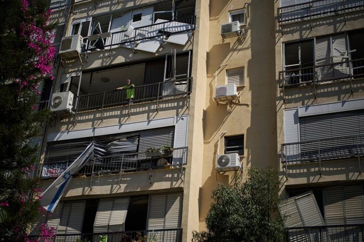 The Latest: Israel and Iran trade strikes as new diplomatic efforts start in Geneva