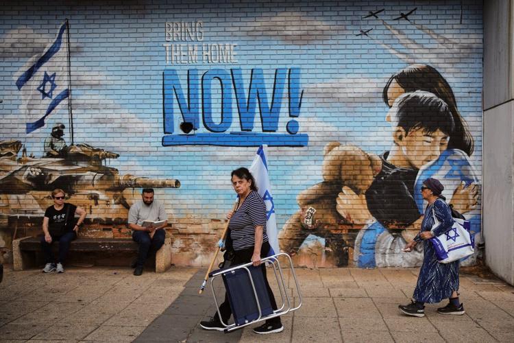 Tens of thousands attend funeral of Israeli soldier whose remains were held in Gaza for 11 years