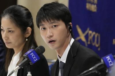 In Japan, which bans dual custody, a table tennis star refuses to hand back her son to her ex