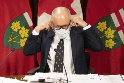 Masking a 'personal choice,' Ford says of video appearing to show maskless top doctor