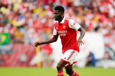 Former Arsenal midfielder Thomas Partey charged with five counts of rape, British police say