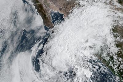 Lorena becomes a post-tropical storm as risks of flooding hang over parts of western Mexico