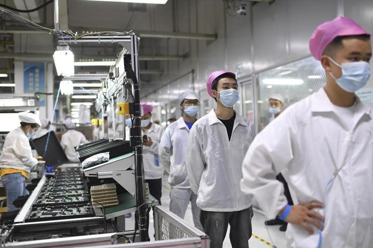 Foxconn apologizes for pay dispute at China factory