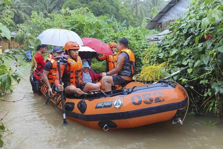Storm sets off floods and landslides in Philippines, leaving at least 9 dead