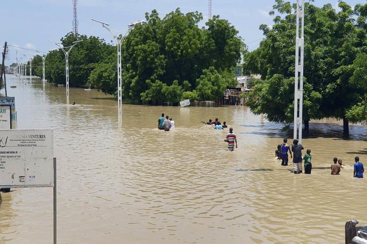A Nigerian city devastated by flooding has quickly recovered. Locals credit community spirit