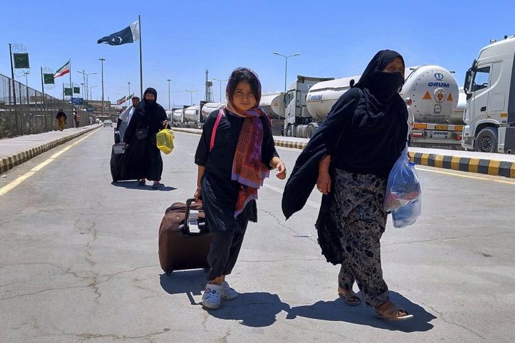 The Latest: Iran's supreme leader rejects call to surrender as Israel strikes Tehran